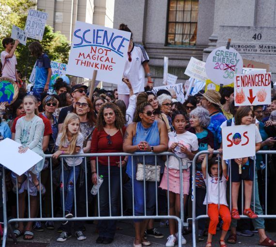 People holding signs during climate strike
