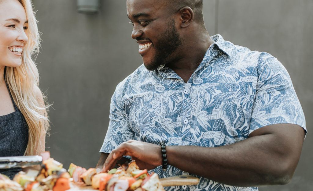 Man and woman eating together