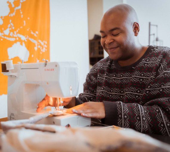 person-using-sewing-machine Person using sewing machine